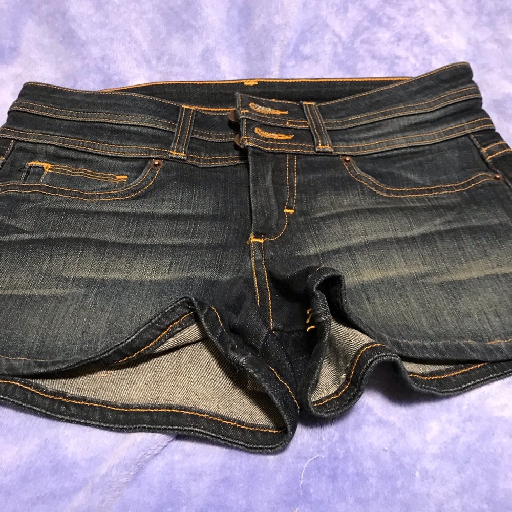 Denim short mid-rise wait five pockets with jewelry and logo name bebe